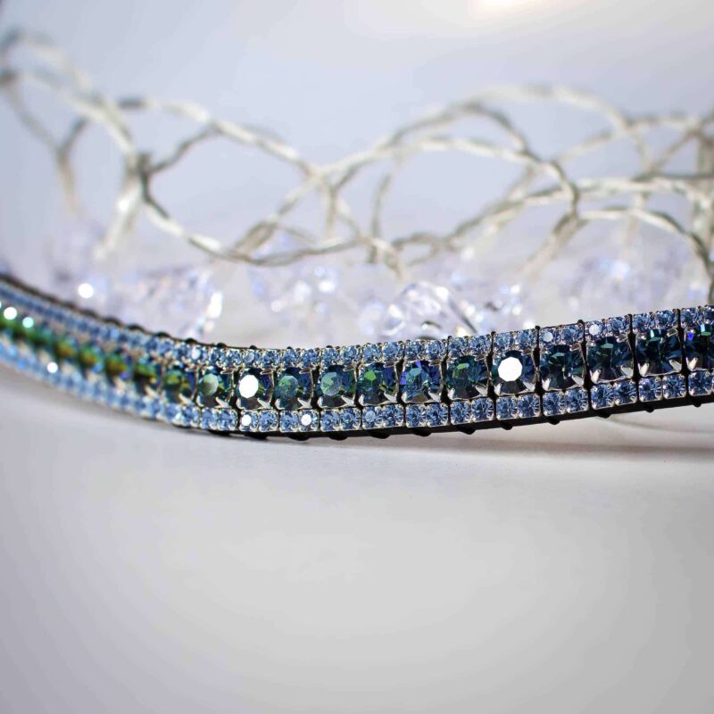 Blue browband on white back ground with crystal lights behind it