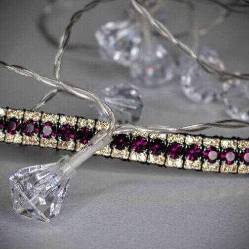 Purple Browband with amethyst and gold edging on a white background with crystal lights