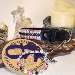 Elegant Custom Colour 5-Row Diamanté Dog Collar on display, featuring rich pink crystals set on black bridle leather from Unicorn Browbands.