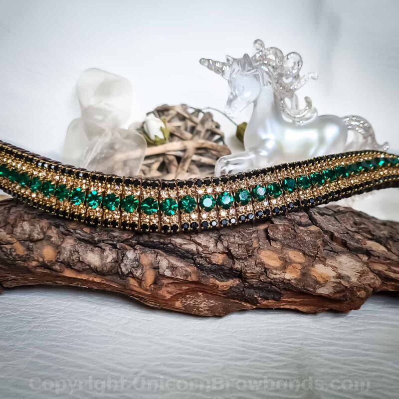 Emerald Envy Browband featuring rich emerald green crystals set amidst gold and jet black accents for a regal equestrian look