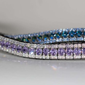 purple browbands and blue browbands crossing over on a white background for dressage and horses