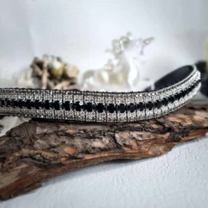 Jet, Clear & Black Diamond Crystal Browband on Display: A close-up shot of a luxury browband featuring a centre row of jet black crystals, surrounded by alternating rows of clear and black diamond crystals, Handmade from Unicorn Browbands UK