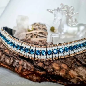 Luxury curved 5 row horse browband featuring Capri Blue, White Opal, and golden Light Colorado Gold crystals