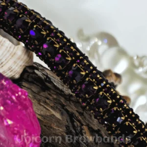 Close-up of 6mm Preciosa Dark Orchid effects crystals framed by 3mm Amethyst crystals on the Plum Noir browband by Unicorn Browbands UK
